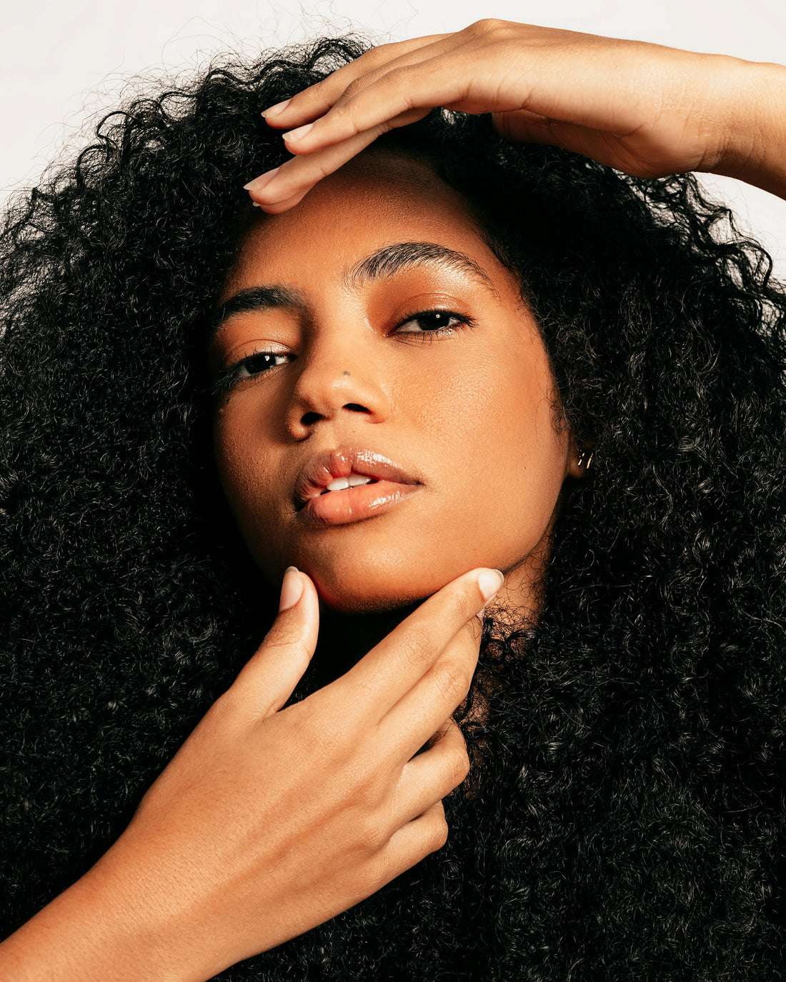 a women showcasing her anti-aging skin in her 40s