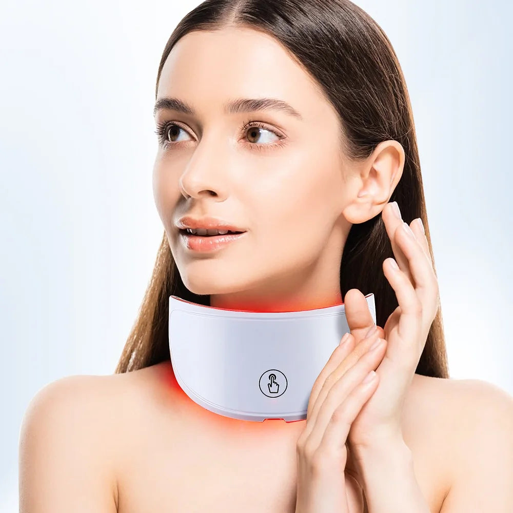 Woman using GlowSculpt red light therapy neck mask for anti-aging